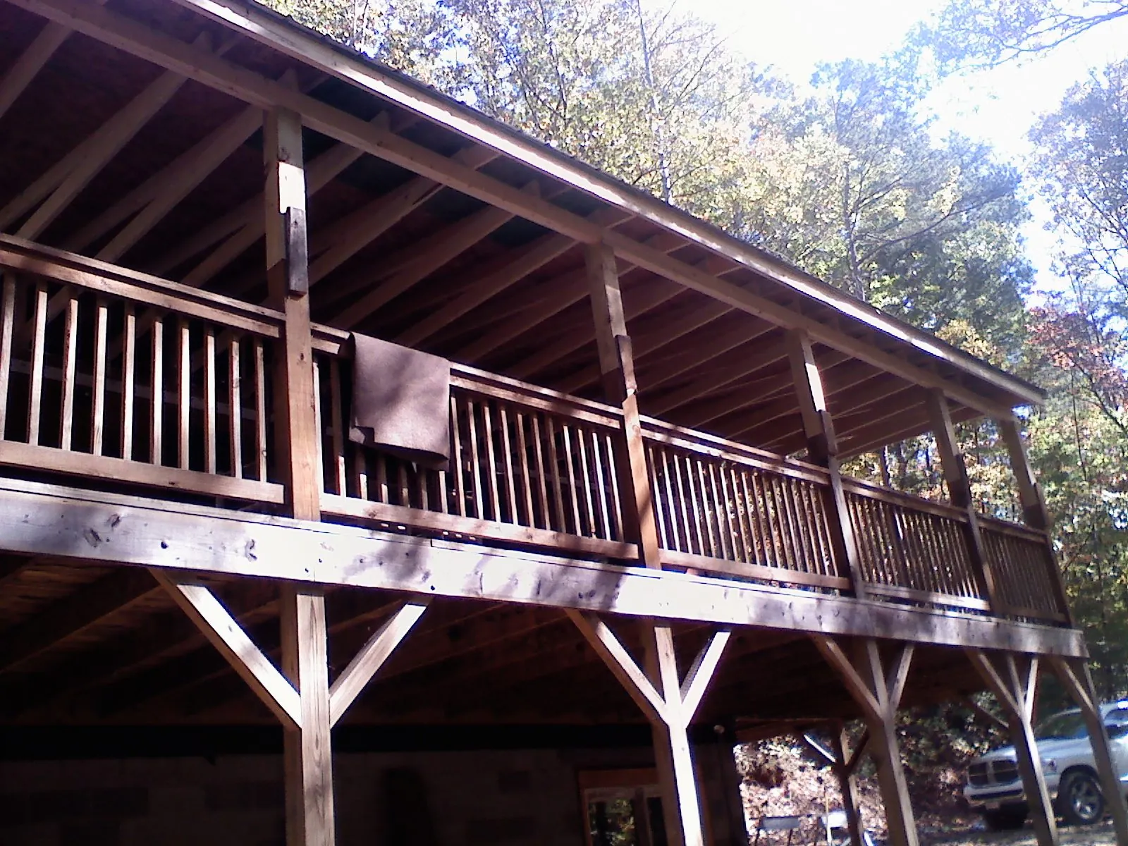Timber framing under a new elevated porch and deck — Roof Leak Repair in Maybell by Roofing Brothers